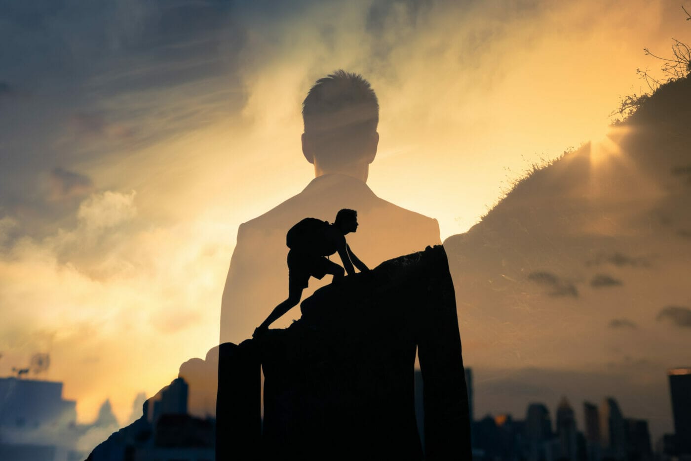 Motivational image of man climbing a hill